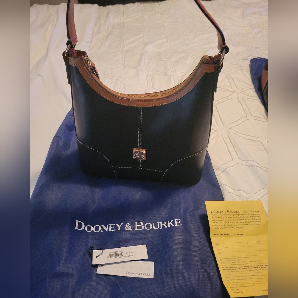 NWOT Dooney & Bourke Black and Tan Selleria Hobo Bag With Dustbag $ Papers